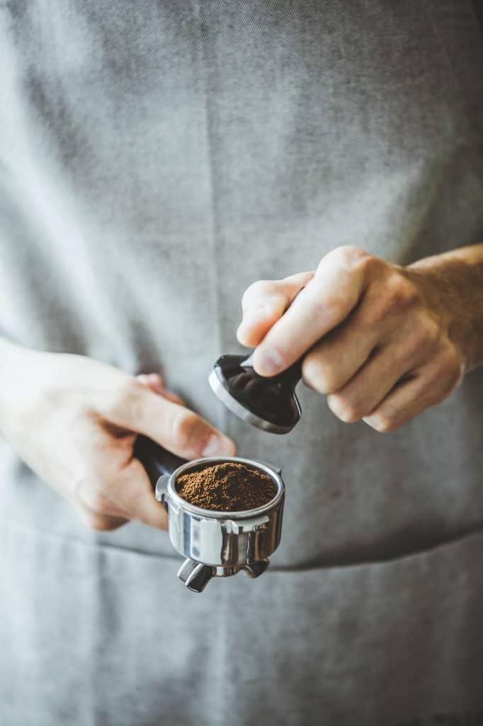 Barista ready for making classic espresso